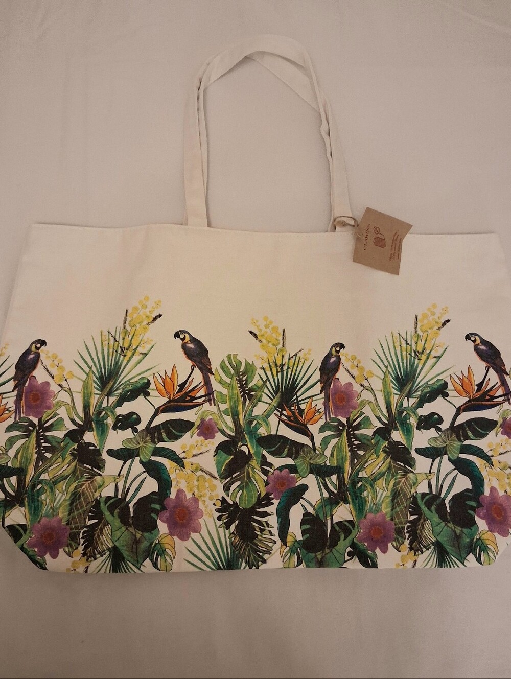 CLARINS CREAM TROPICAL BIRD PRINT CANVAS TOTE BAG